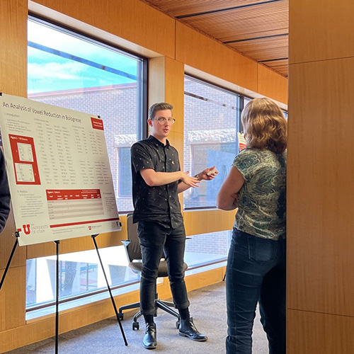 Brandon presenting a poster